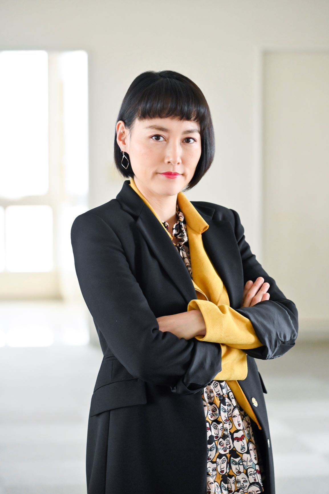 菊地凛子演じる九品仏さやか。