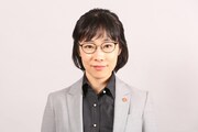 山田真歩演じる小暮クミコ。