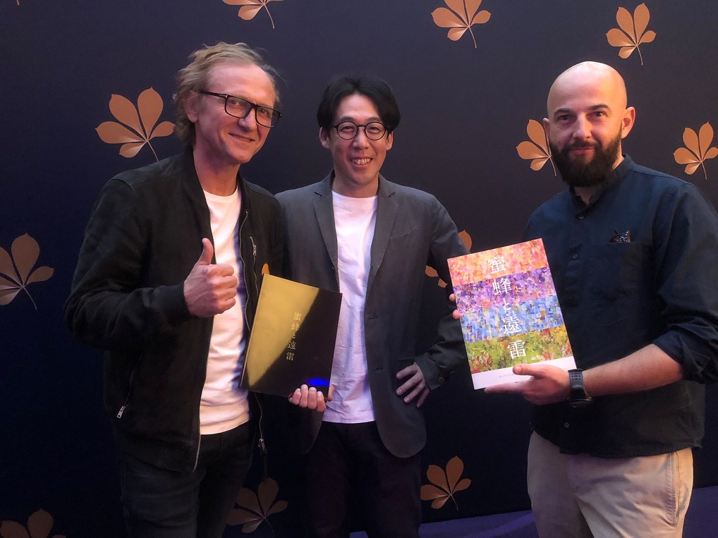 左からアンジェイ・ヒラ、石川慶、ピオトル・ニエミイスキ。