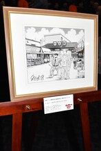 秋本治による「こちら葛飾区亀有公園前派出所」と「男はつらいよ」のコラボイラスト。