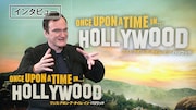 インタビューを受けるクエンティン・タランティーノ。