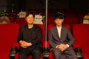 左から李相日、妻夫木聡。