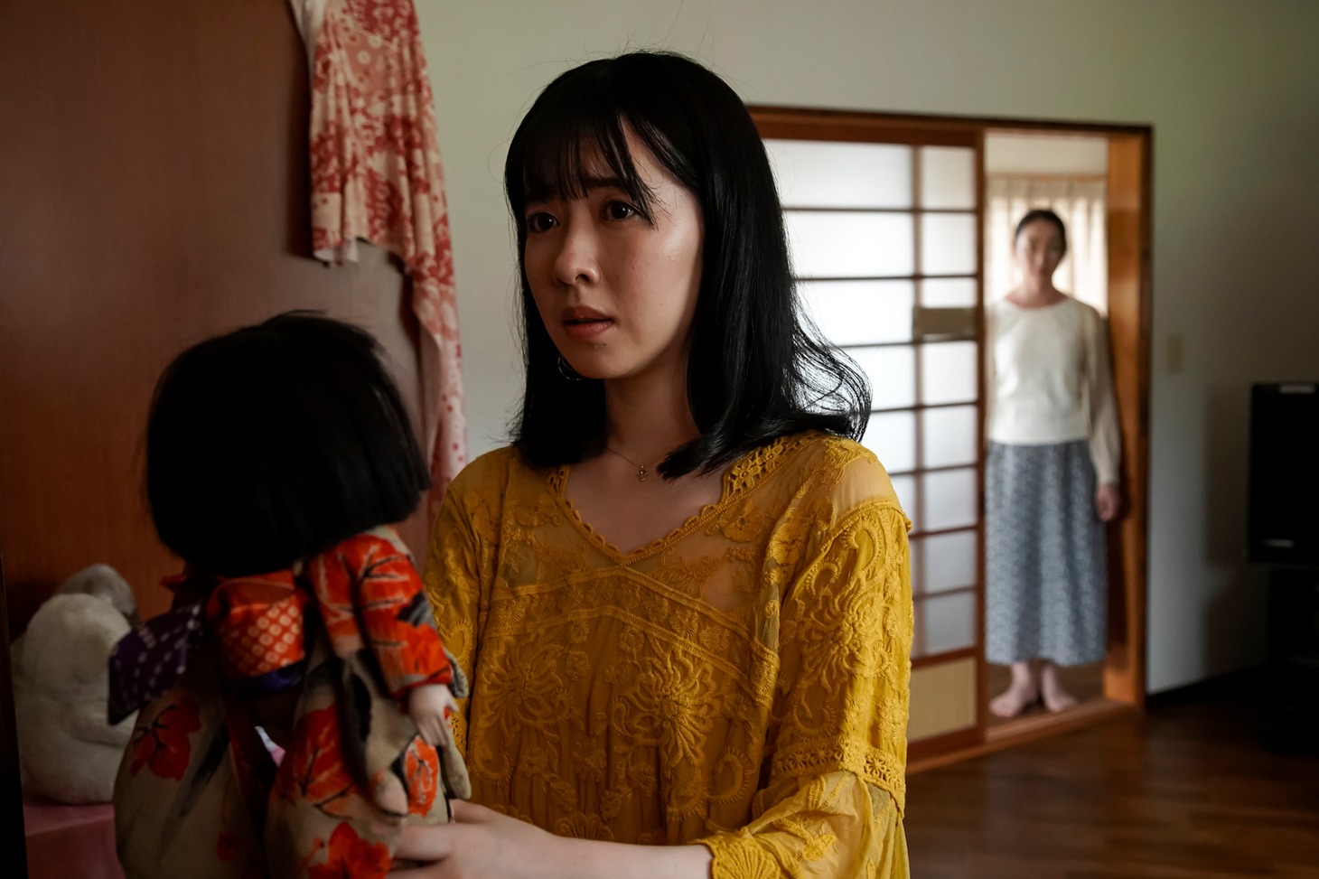 「持たされた人形」