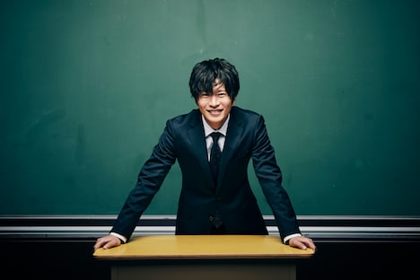 田中圭演じる義澤経男。