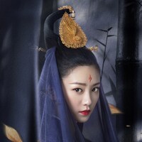 アンジェラ・ユン演じる明河（めいか）。