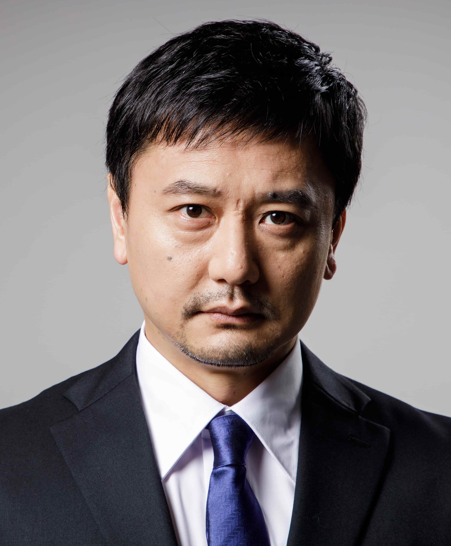 信國輝彦