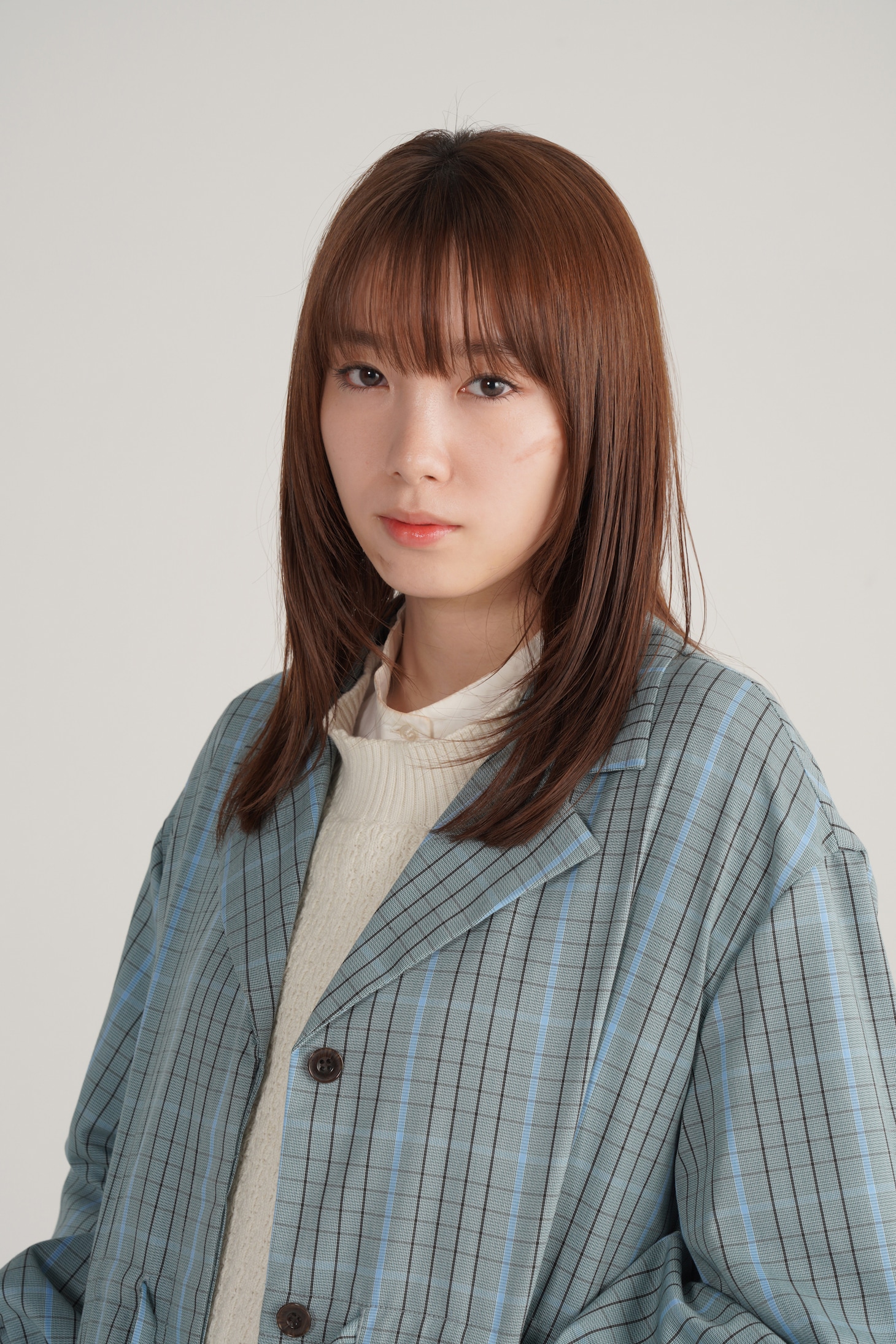飯豊まりえ演じる柊木佳奈恵。