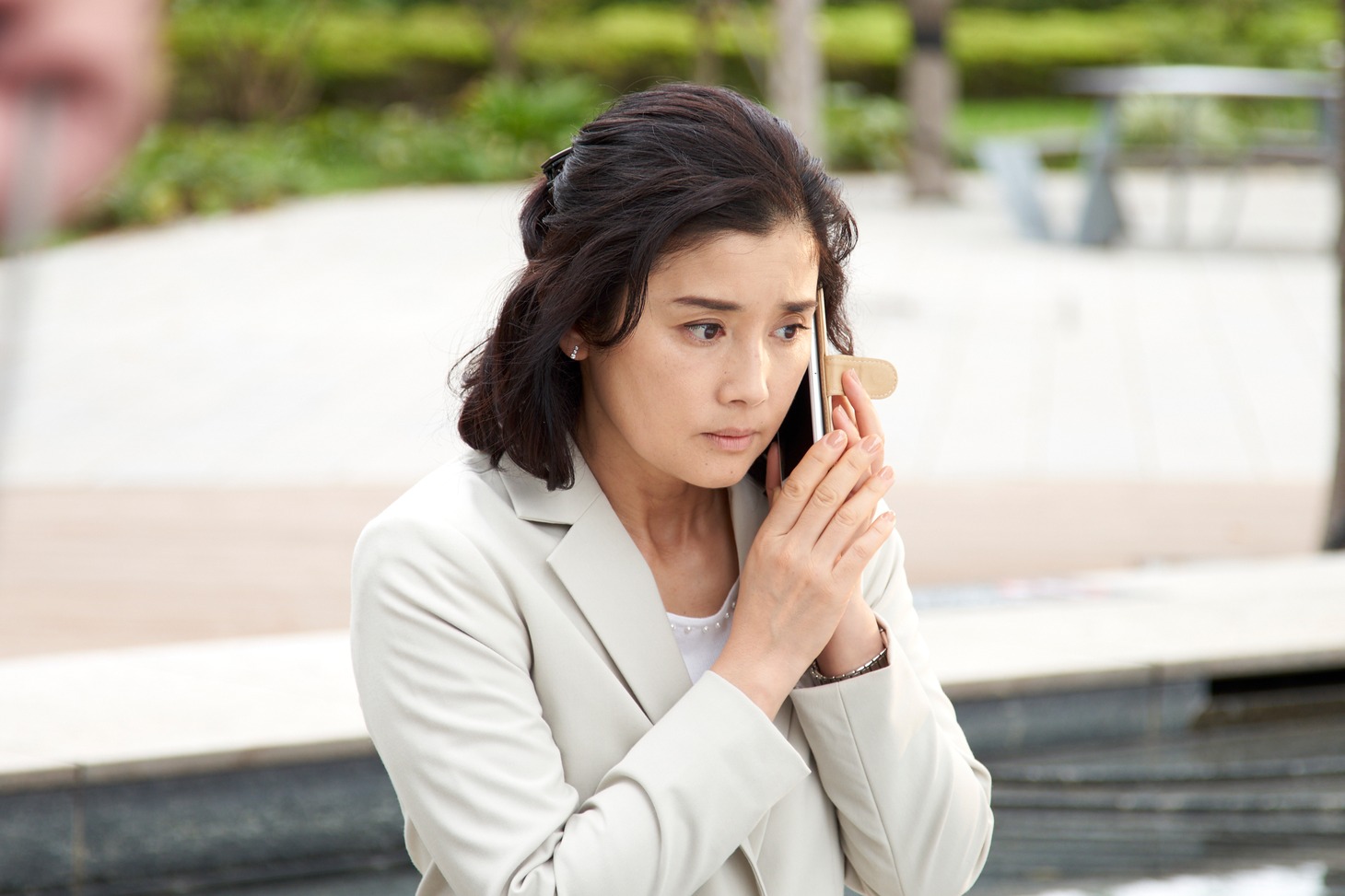 石田ひかり演じる花村玲子。