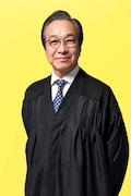 小日向文世演じる駒沢義男。