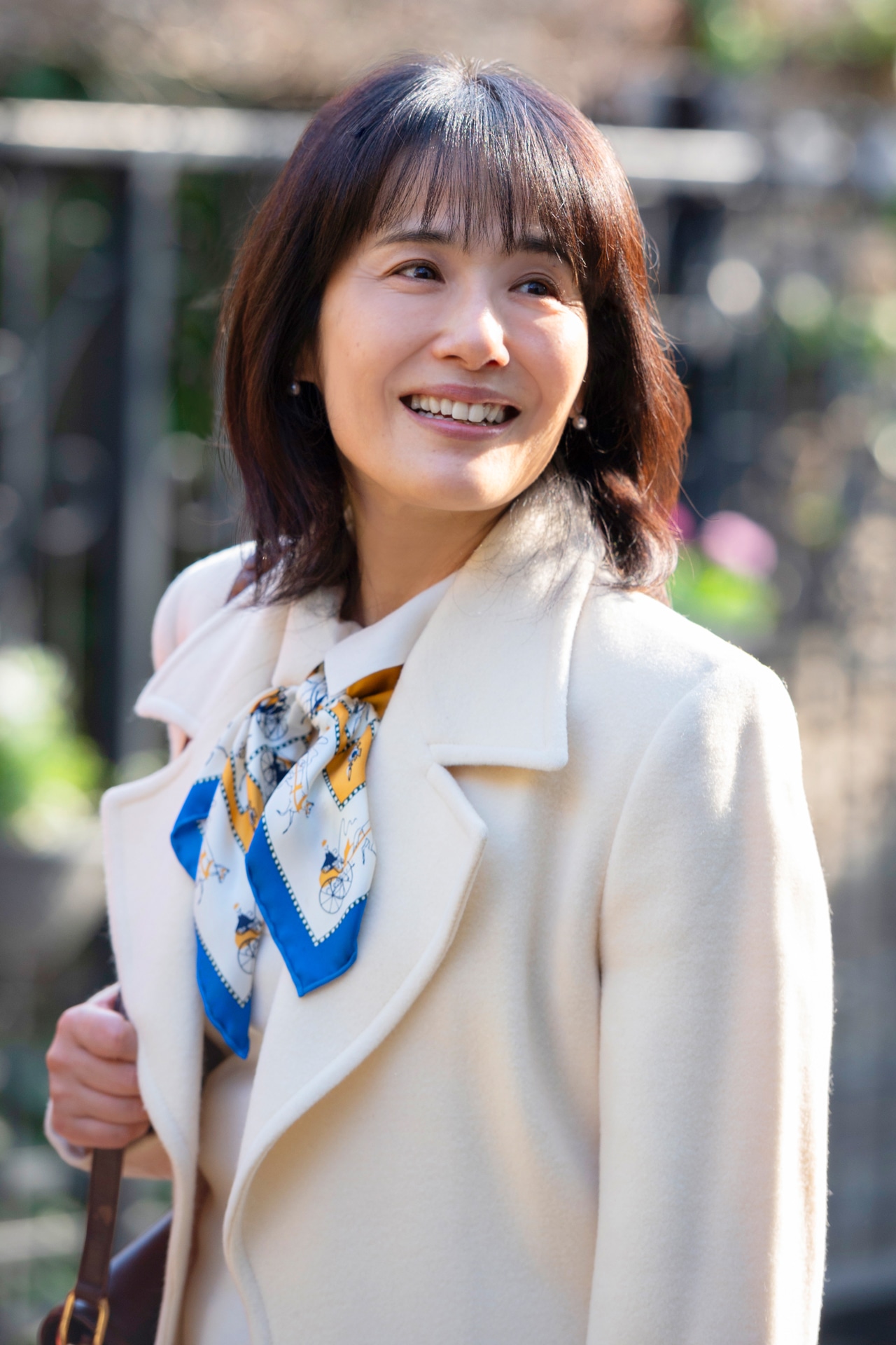 富田靖子演じるトキコの母。
