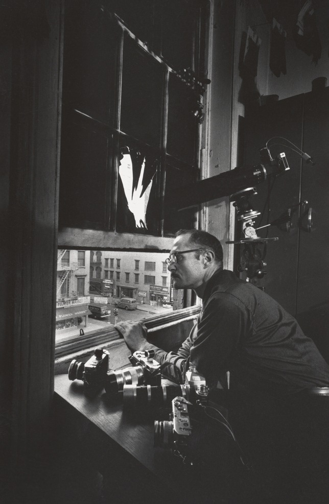 「ジャズ・ロフト」 W. Eugene Smith at the Jazz Loft window, 1959. Credit: Self-portrait, W. Eugene Smith, (c) 1959 The Heirs of W. Eugene Smith.