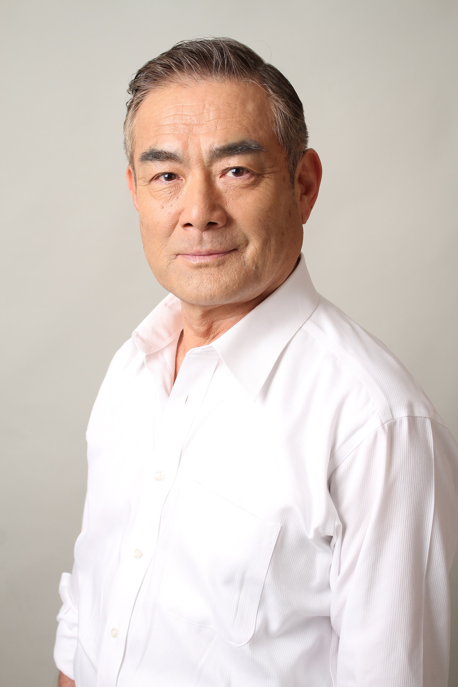 辻萬長