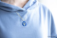 「Donguri Closet 限定 天空の城ラピュタ リラックスウェア 空から舞い降りた天使のワンピース」より、飛行石の刺繍。