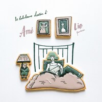 「アメリ」をモチーフにしたアイシングクッキー。トモマツユキによるイラストとのコラボレーション。