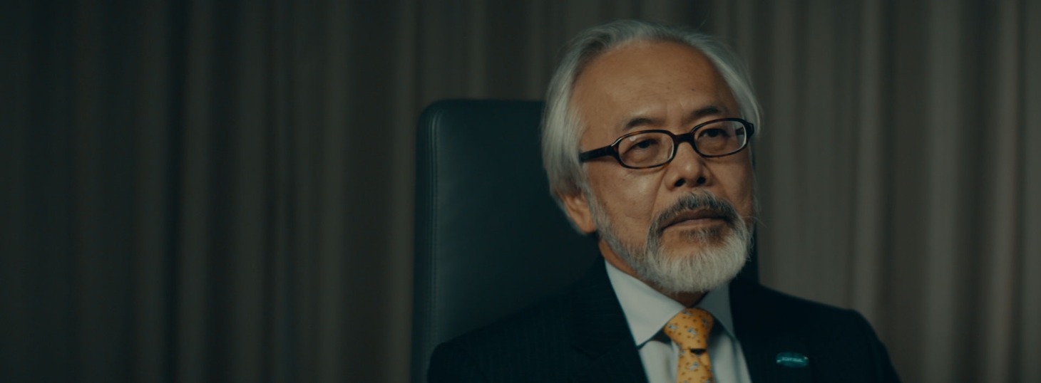 「カルロス・ゴーン 最後のフライト」より、弁護士の高野隆。