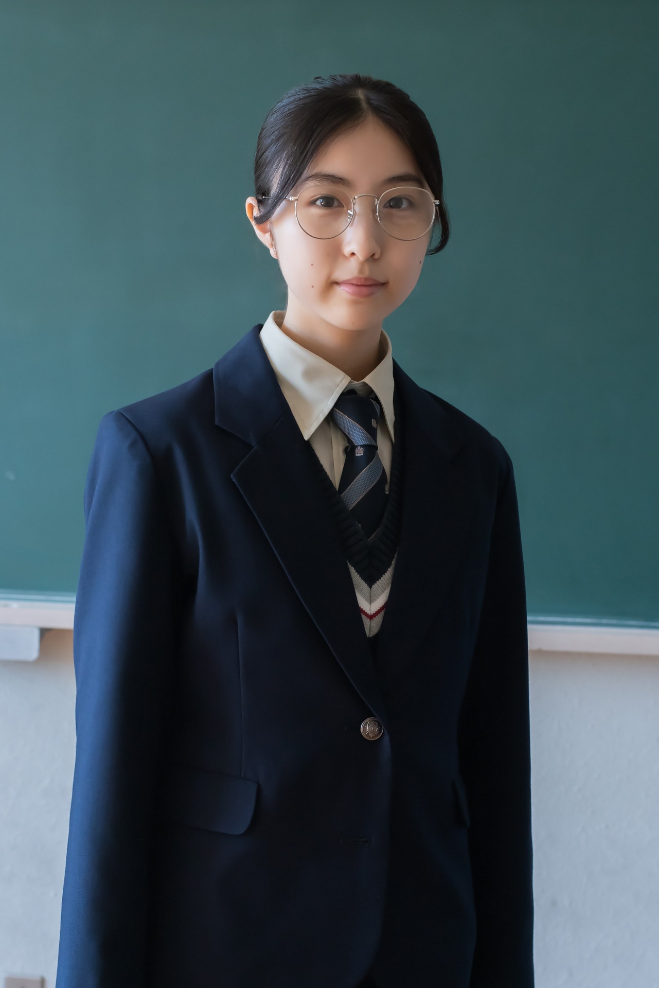 倉田役の中村守里。