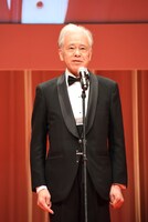 チェアマンの安藤裕康。