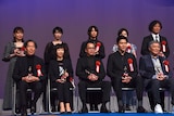 後列左から穐山茉由、石川瑠華、伊澤彩織、伊藤万理華、高田聡。前列左から上田義彦、西川美和、堀貴秀、鈴木亮平、小倉智昭。
