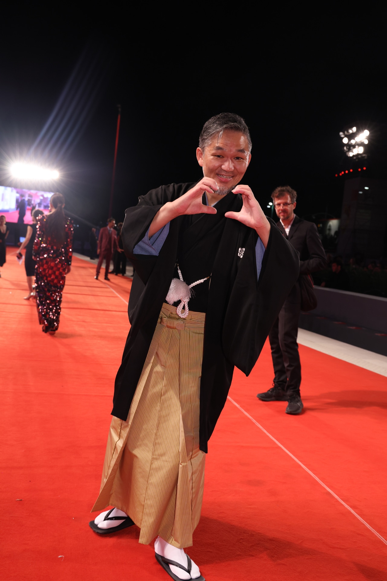 第79回ヴェネツィア国際映画祭のレッドカーペットを歩く砂田アトム。(c)Kazuko Wakayama