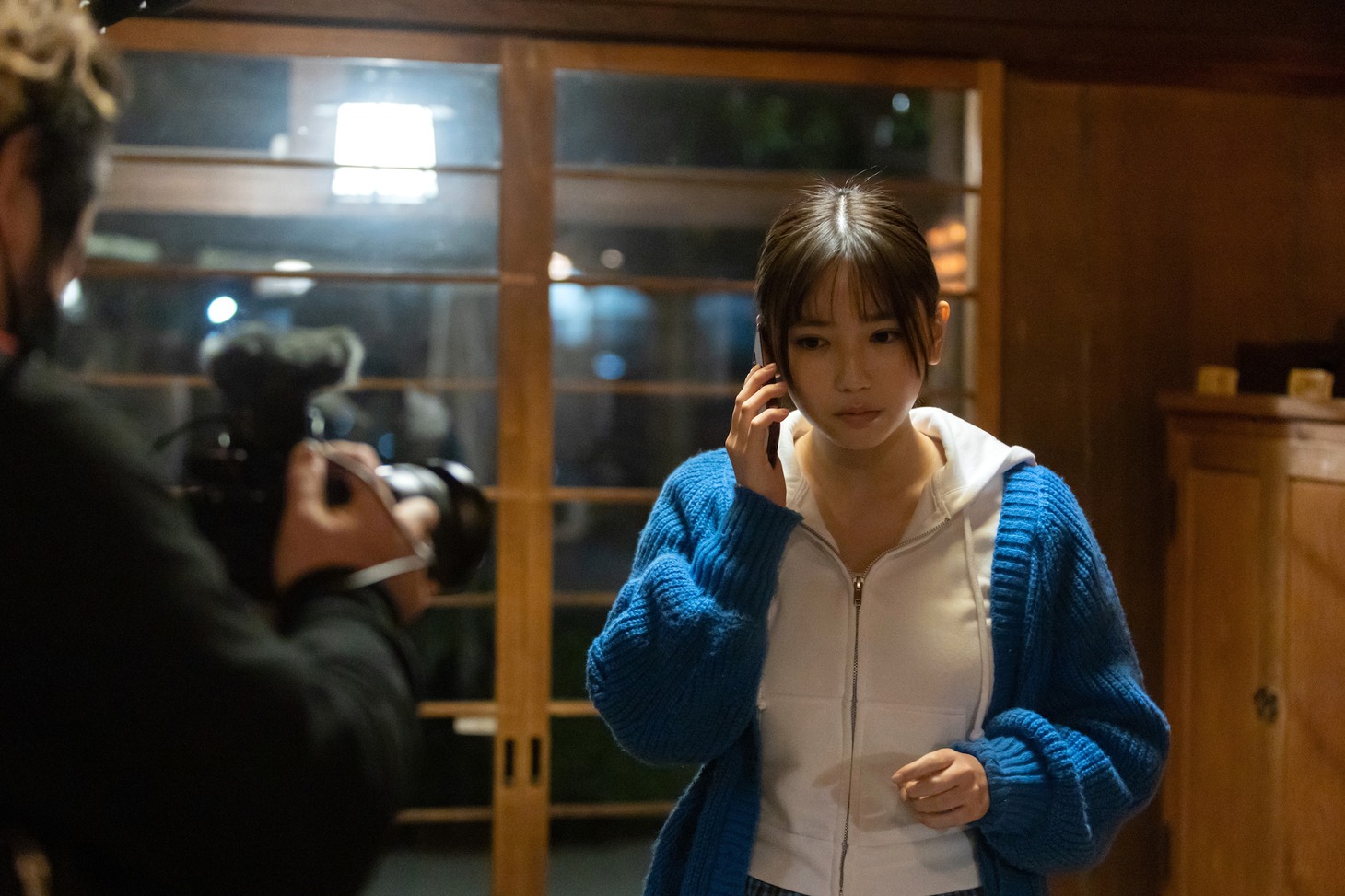 高梨リサ役の沢口愛華。