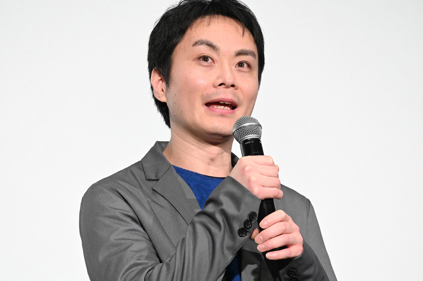 堂山卓見