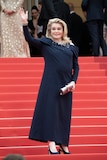 第76回カンヌ国際映画祭の開会式に参加したカトリーヌ・ドヌーヴ。(写真提供:Abaca Press / Niviere David / Abaca / Sipa USA / Newscom / ゼータ イメージ)