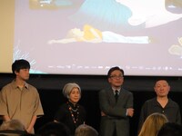 第76回カンヌ国際映画祭「逃げきれた夢」公式上映の様子。