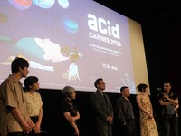 第76回カンヌ国際映画祭「逃げきれた夢」公式上映の様子。