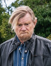 ブレンダン・グリーソン演じるリーアム。