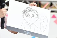 畑芽育による堤幸彦の似顔絵。