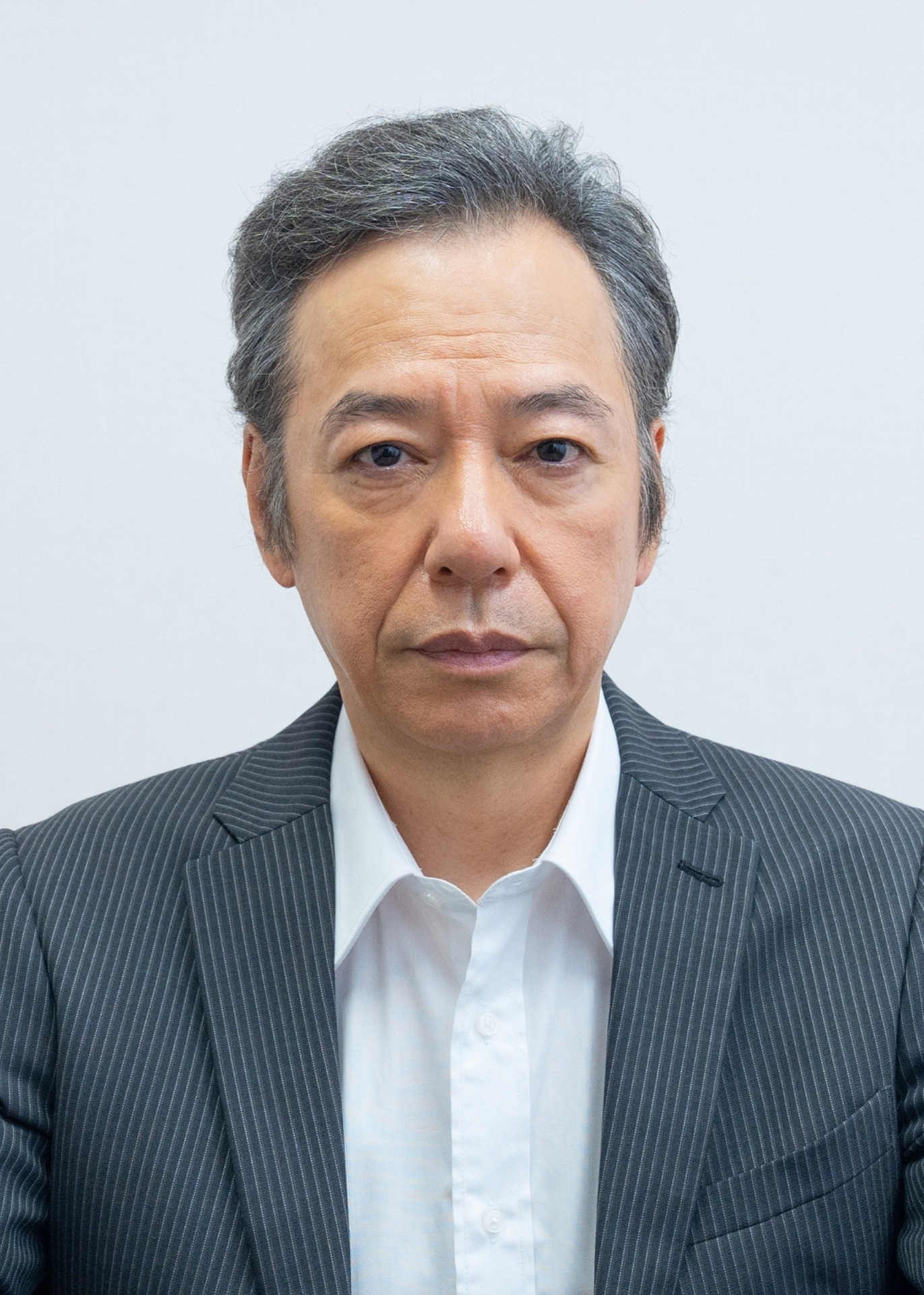 駒津謙一郎を演じる板尾創路。