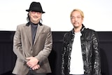 「『攻殻機動隊 STAND ALONE COMPLEX』20周年記念上映&トークショー」の様子。左から大塚明夫、神山健治監督。