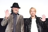 「攻殻機動隊 STAND ALONE COMPLEX」20周年記念上映・トークショーの様子。左から大塚明夫、神山健治。