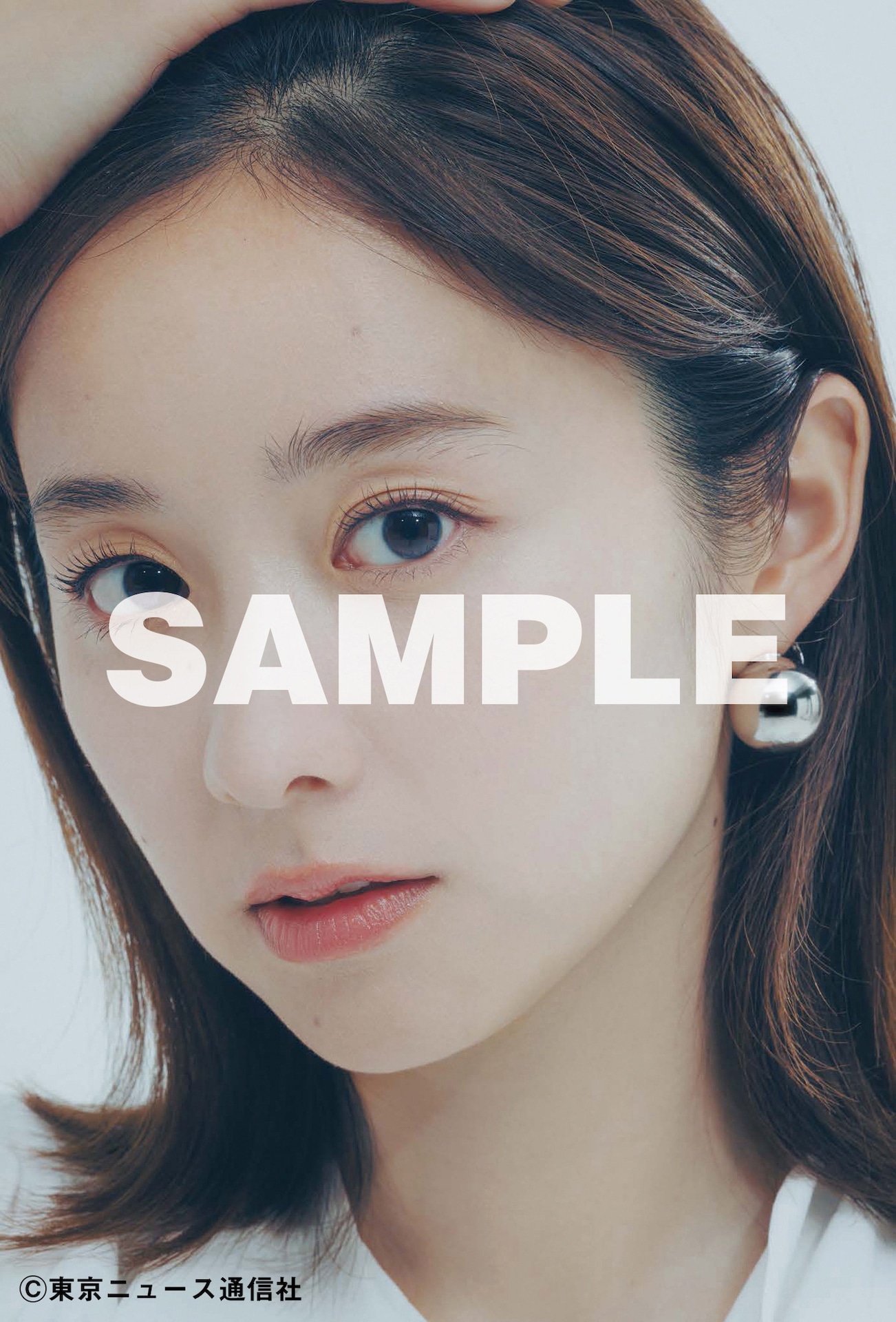 楽天ブックス購入特典のポストカード（イメージ / 堀田真由）。