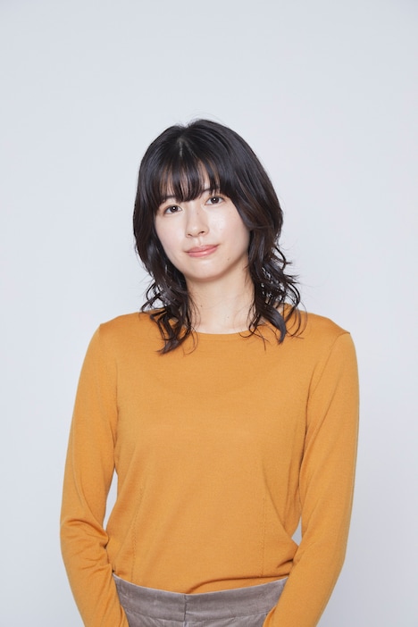 里香役の佐久間由衣。