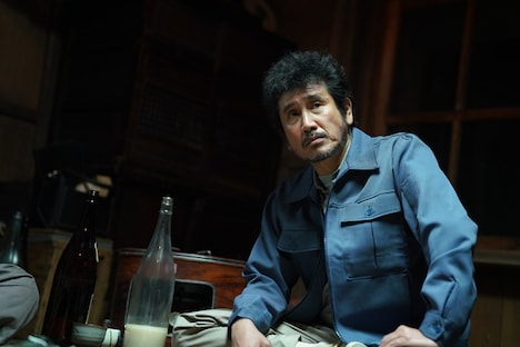 「プロミスト・ランド」より、渋川清彦演じる田島。