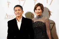 「The Goldfinger（英題）」で主演男優賞にノミネートされたトニー・レオン（左）と、女優で妻のカリーナ・ラウ（右）。