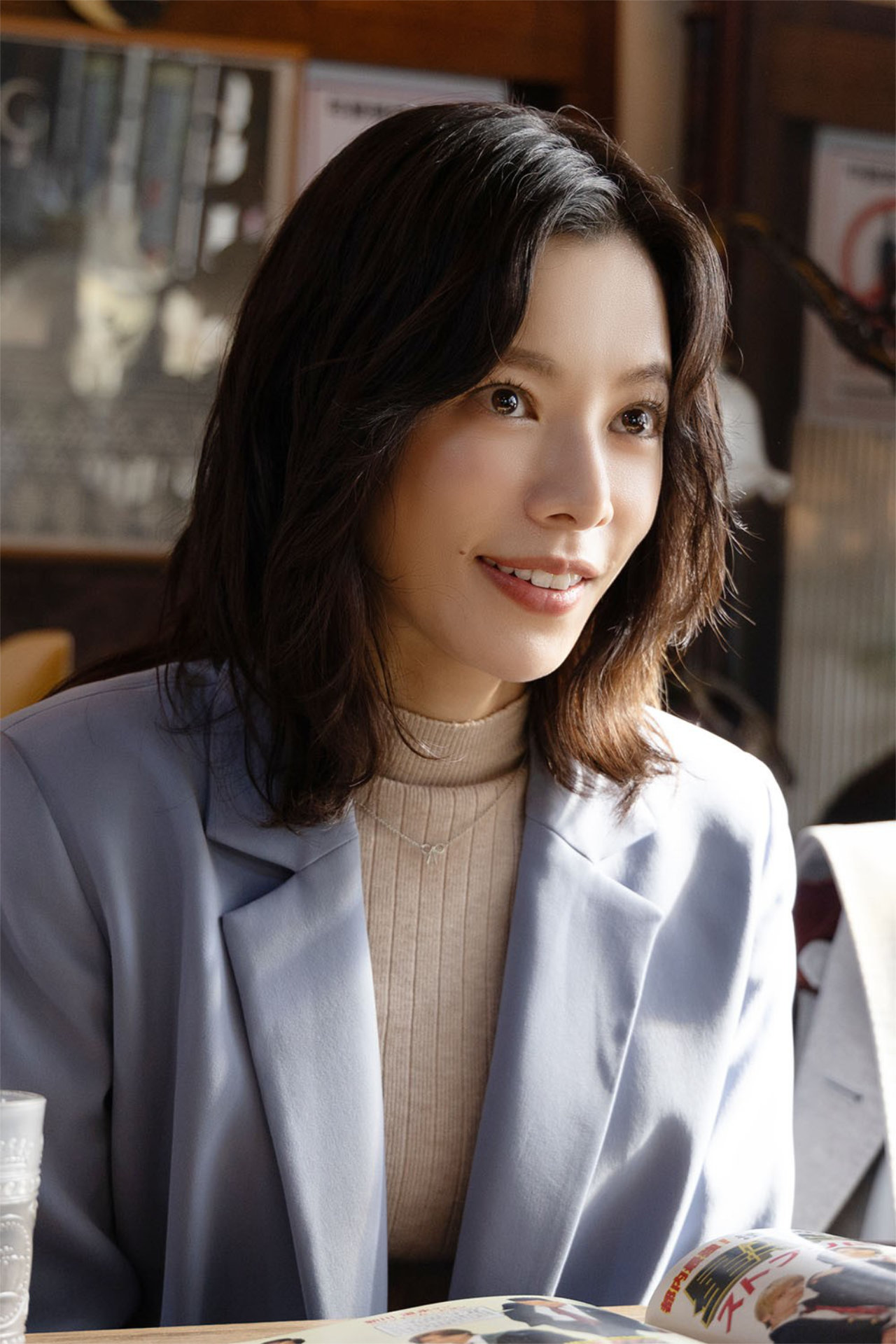 新村萌香役の桜井ユキ。
