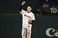 投球前に肩を回す川西拓実。