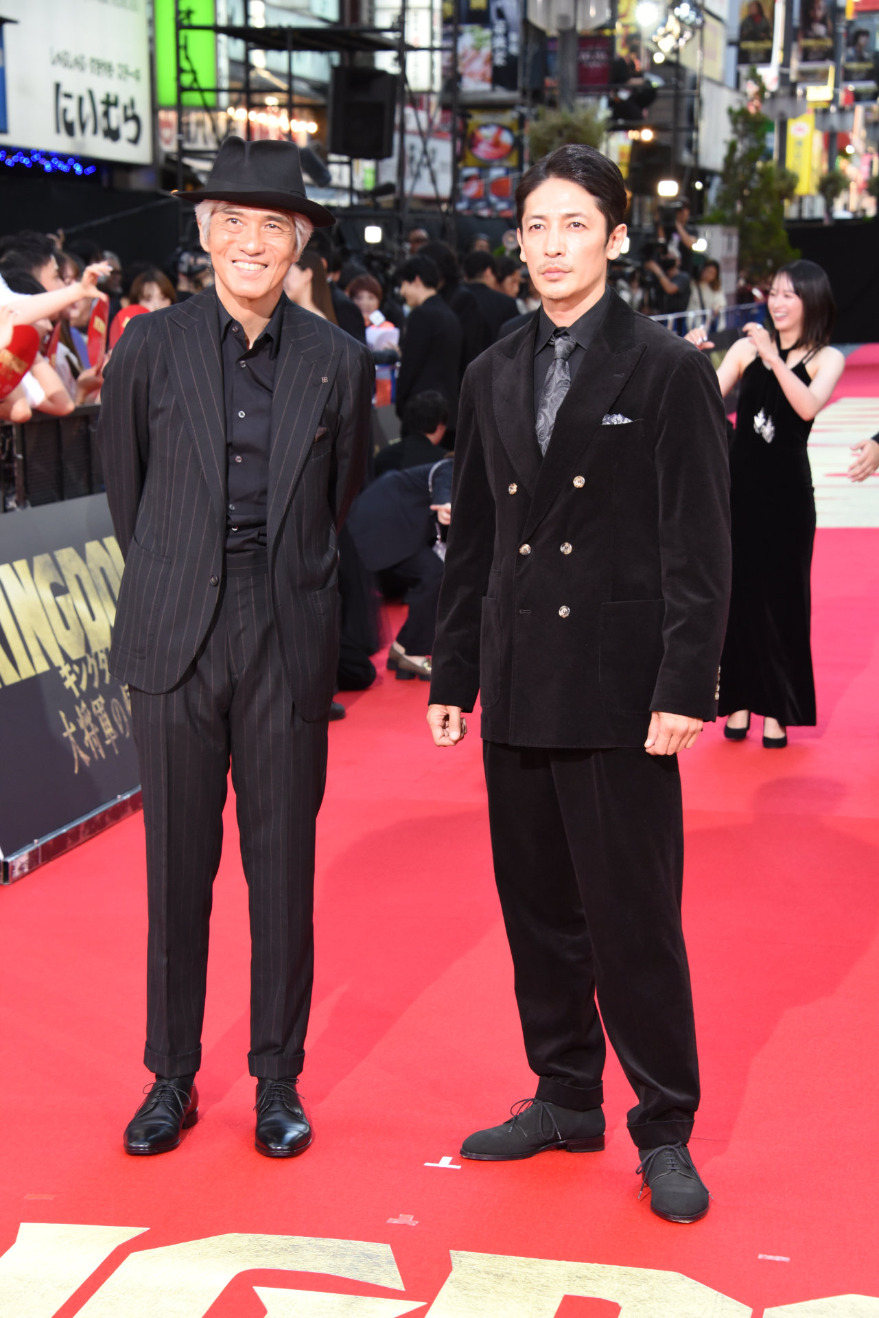 左から佐藤浩市、玉木宏。