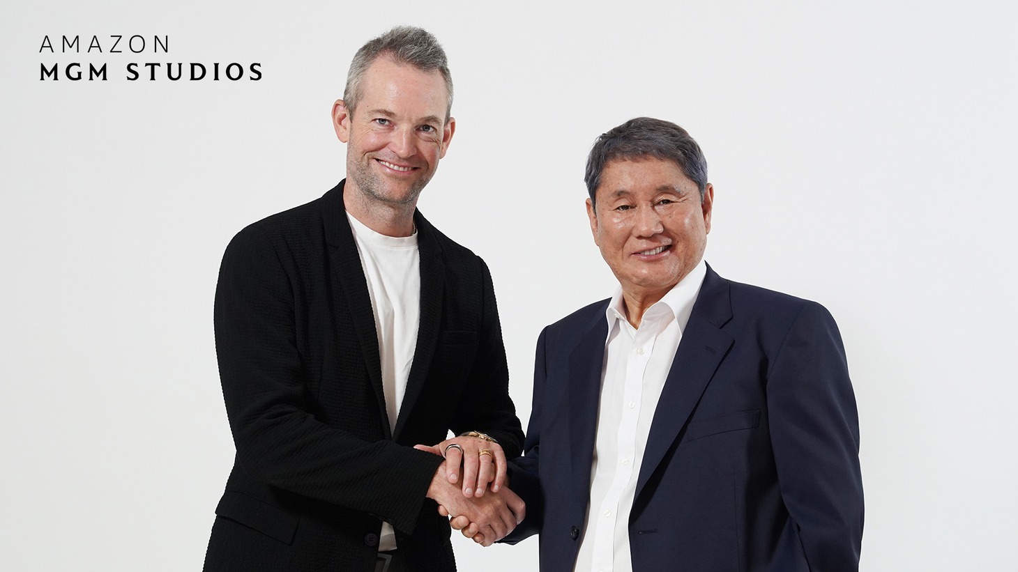左からジェームズ・ファレル、北野武。