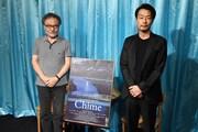 「Chime」初日舞台挨拶の様子。左から黒沢清、吉岡睦雄。