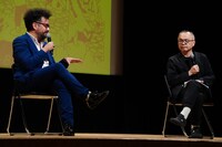 左からホアキン・コシーニャ、山村浩二。