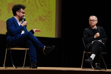 左からホアキン・コシーニャ、山村浩二。