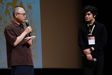 左から山村浩二、ウスマン・リアズ。