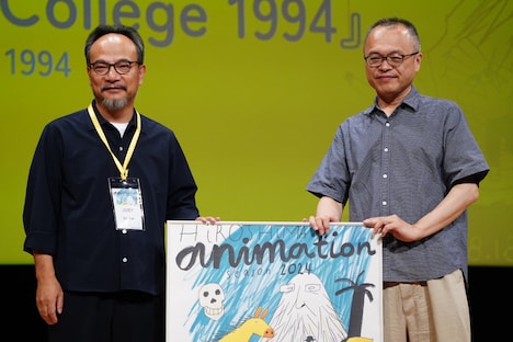 左からリュウ・ジエン、山村浩二。