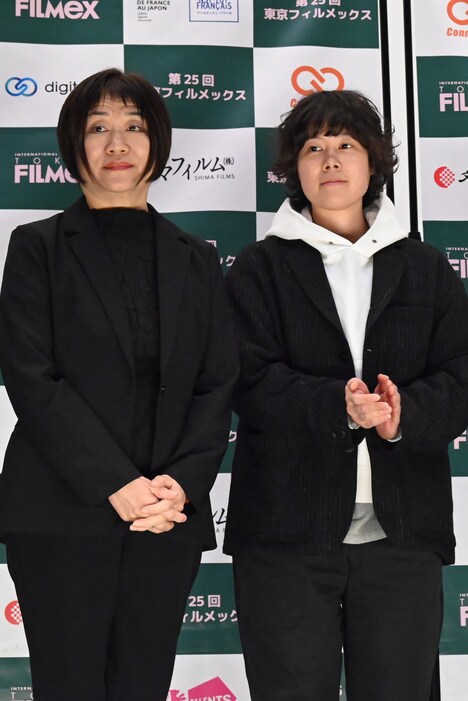 「未完成の映画」のプロデューサー兼脚本担当のマー・インリー（左）、プロデューサーのアレックス・C・ロー（右）