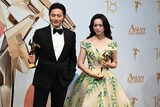 左からチャン・ドンゴン、タン・ウェイ