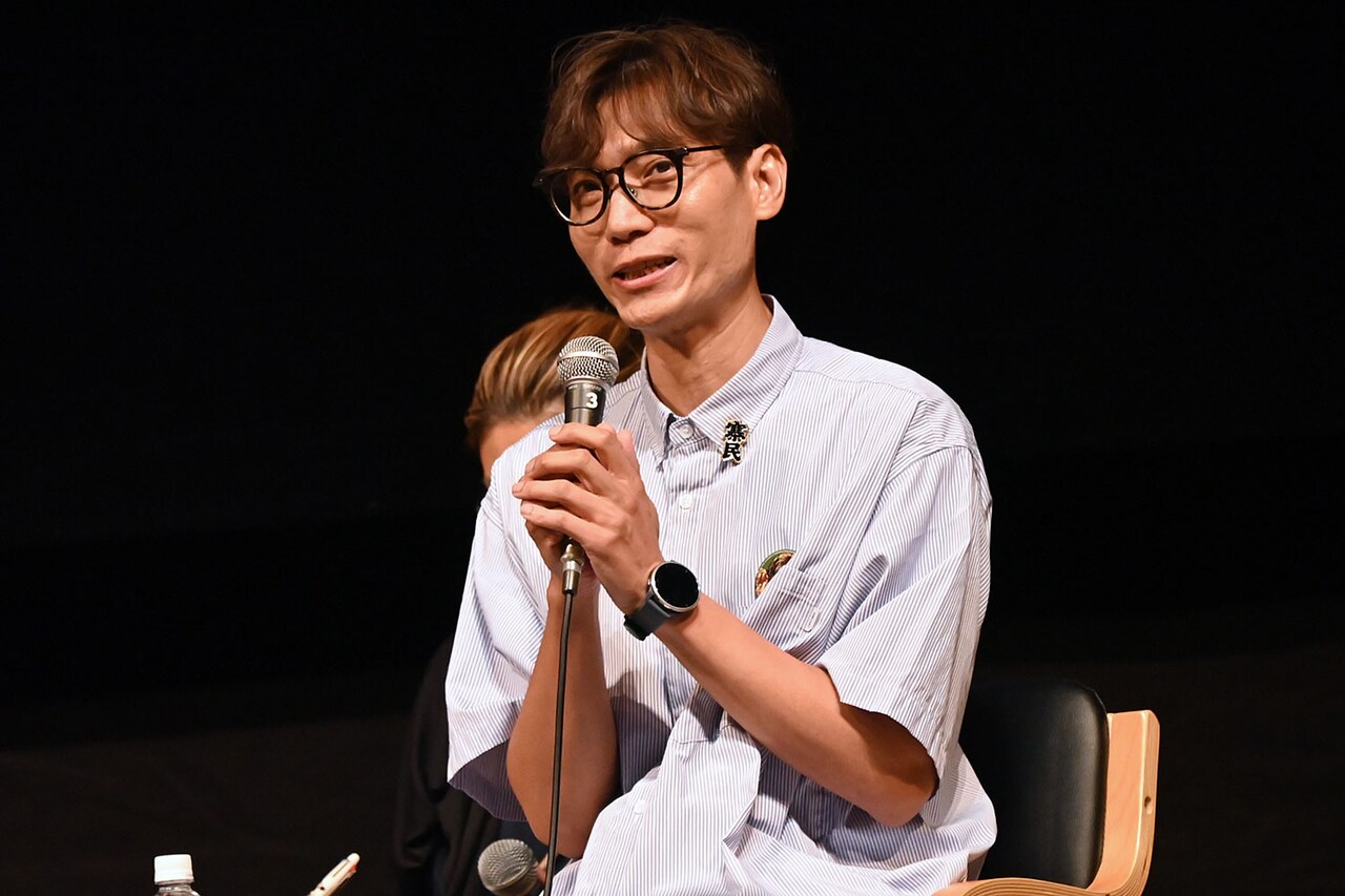 「九龍城砦 I 囲城」著者・余兒の来日ファンミーティングの様子