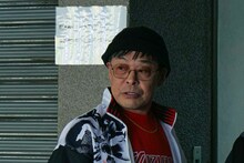 映画「ナイトフラワー」より、光石研演じる多田真司。多摩恵が所属するジムの会長を務めている